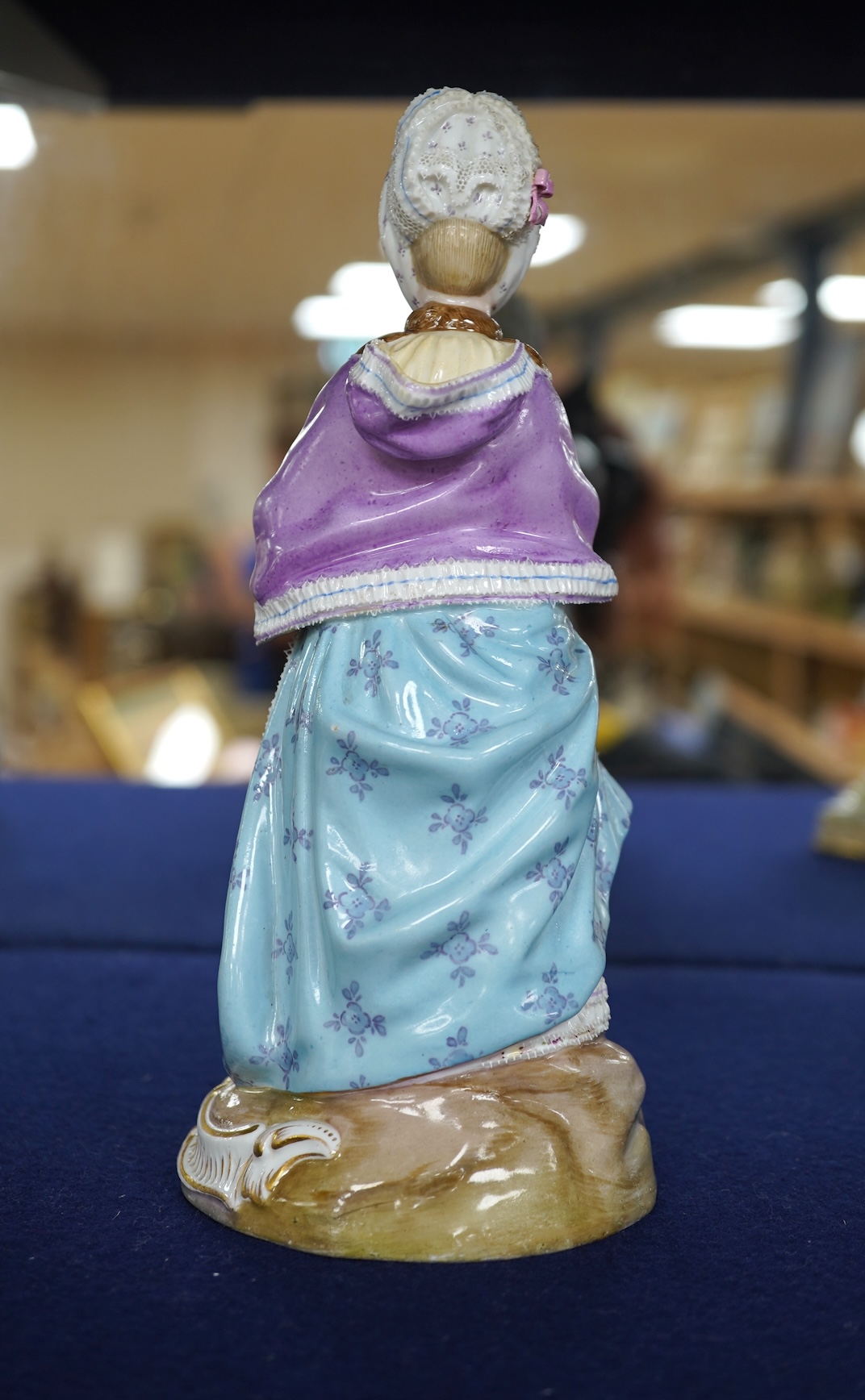 A Meissen porcelain figure, The Racegoers Companion, after Acier, incised number D66, 20cm